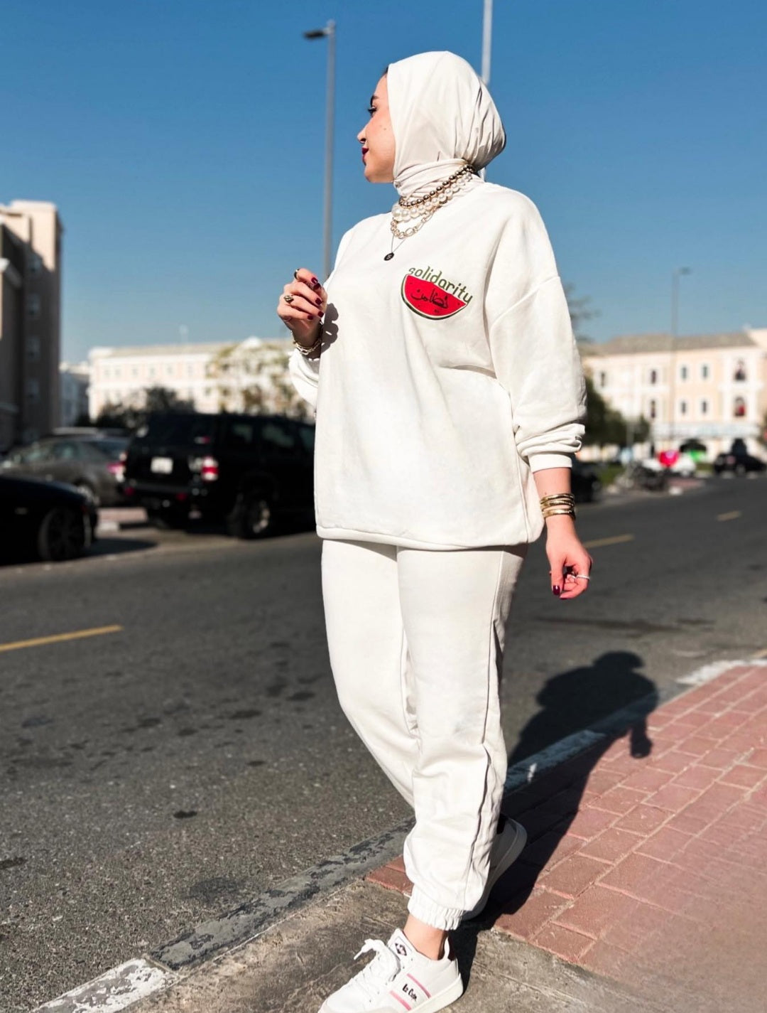 White tracksuit with melon