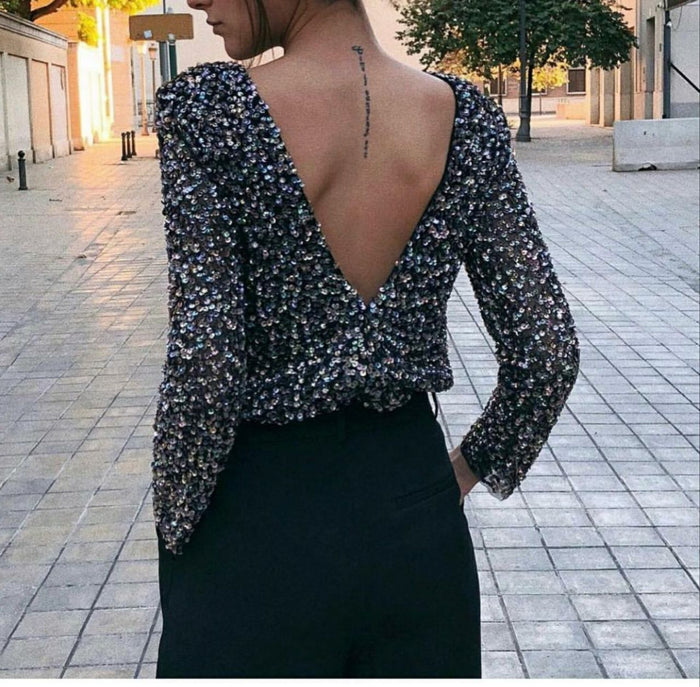 black sequined jumpsuit