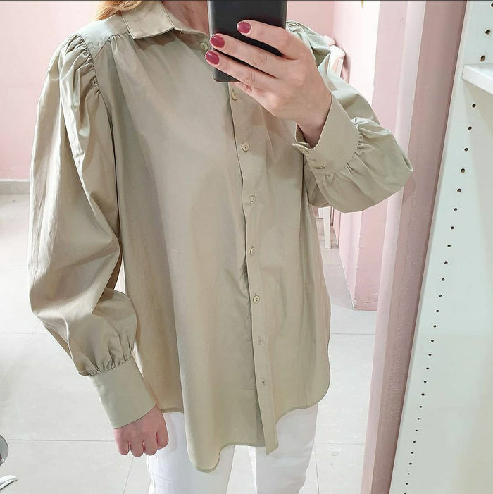 beige shirt